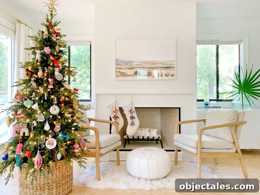 Bedroom fireplace scene with Christmas tree chairs and stockings
