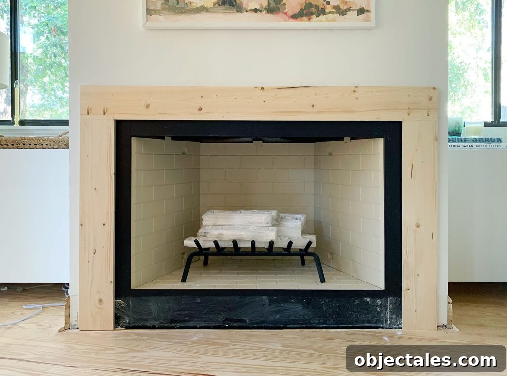 Mantel Brace Piece Made Of Raw Wood Surrounding Fireplace On 3 Sides