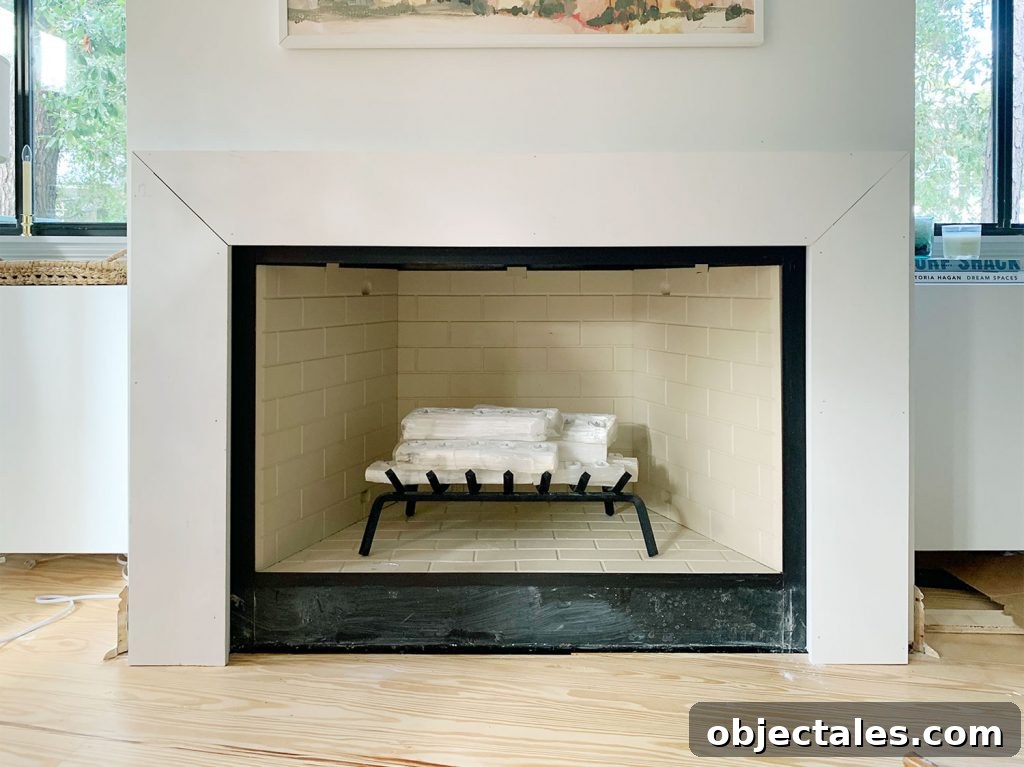 Thick White Board Added To Top Of Fireplace Mantel To Completely Cover Brace