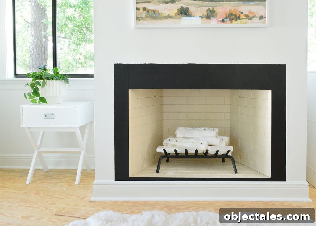 Fireplace with metal cleaned and painted and interior brick painted beige
