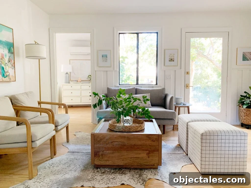 Choosing the Perfect Loveseat for Your Sitting Room 2 Sitting area including wood coffee table two plaid ottomans two arm chairs and gray loveseat