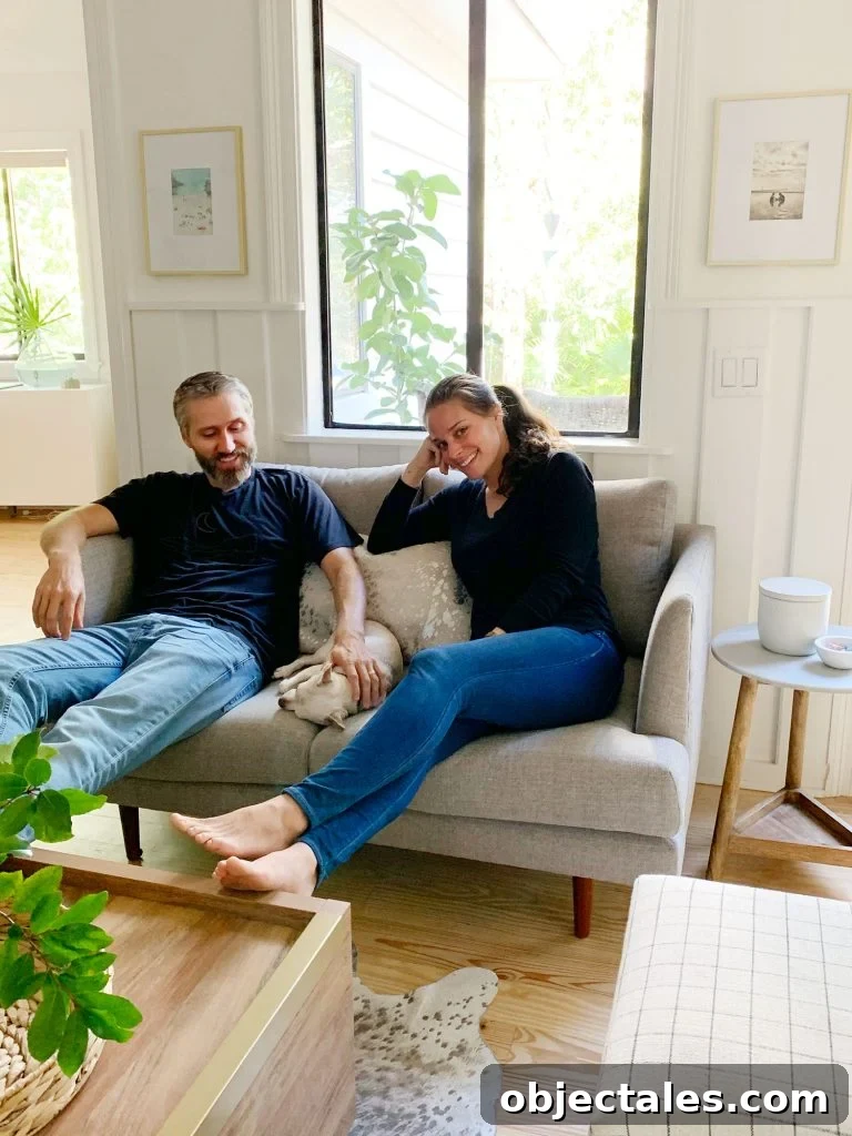 Find the Perfect Loveseat for Your Sitting Room 19 John and Sherry sitting with chihuahua on gray loveseat together