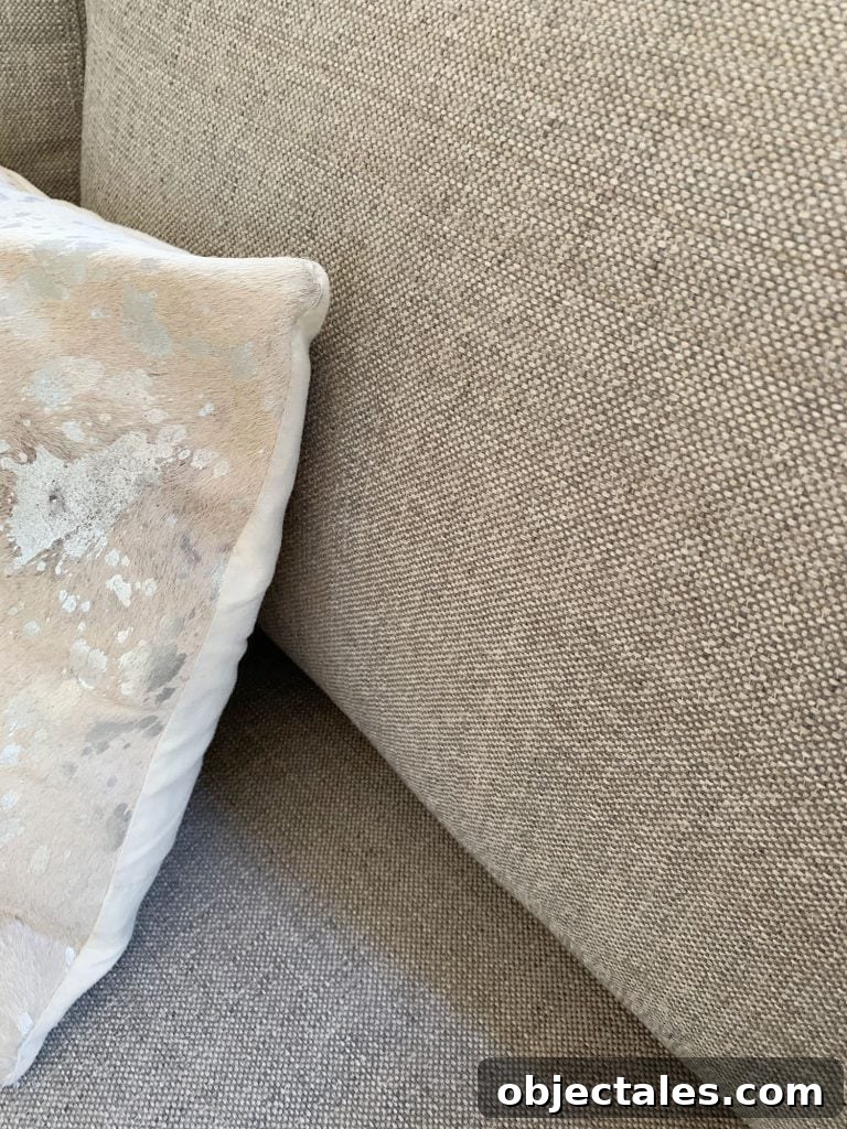 Find the Perfect Loveseat for Your Sitting Room 20 Detail of gray fabric on loveseat