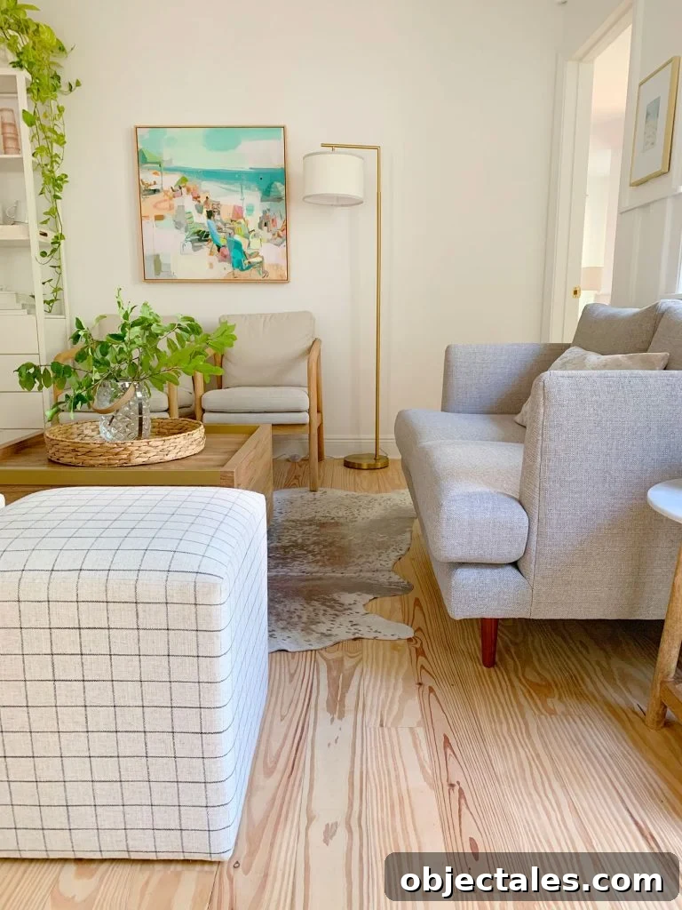 Choosing the Perfect Loveseat for Your Sitting Room 6 Walkway space in front of gray loveseat in downstair sitting area