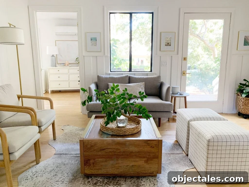 Choosing the Perfect Loveseat for Your Sitting Room 7 Sitting area including wood coffee table two plaid ottomans two arm chairs and gray loveseat