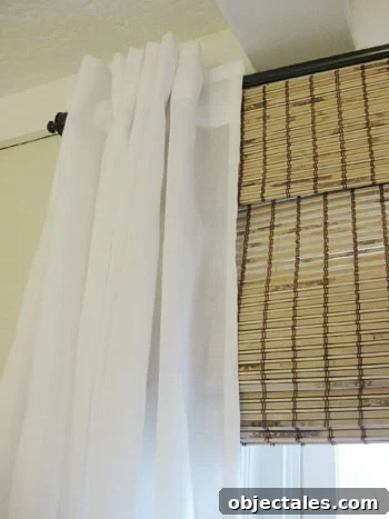 curtain-and-bamboo-roman-shade-detail-photo