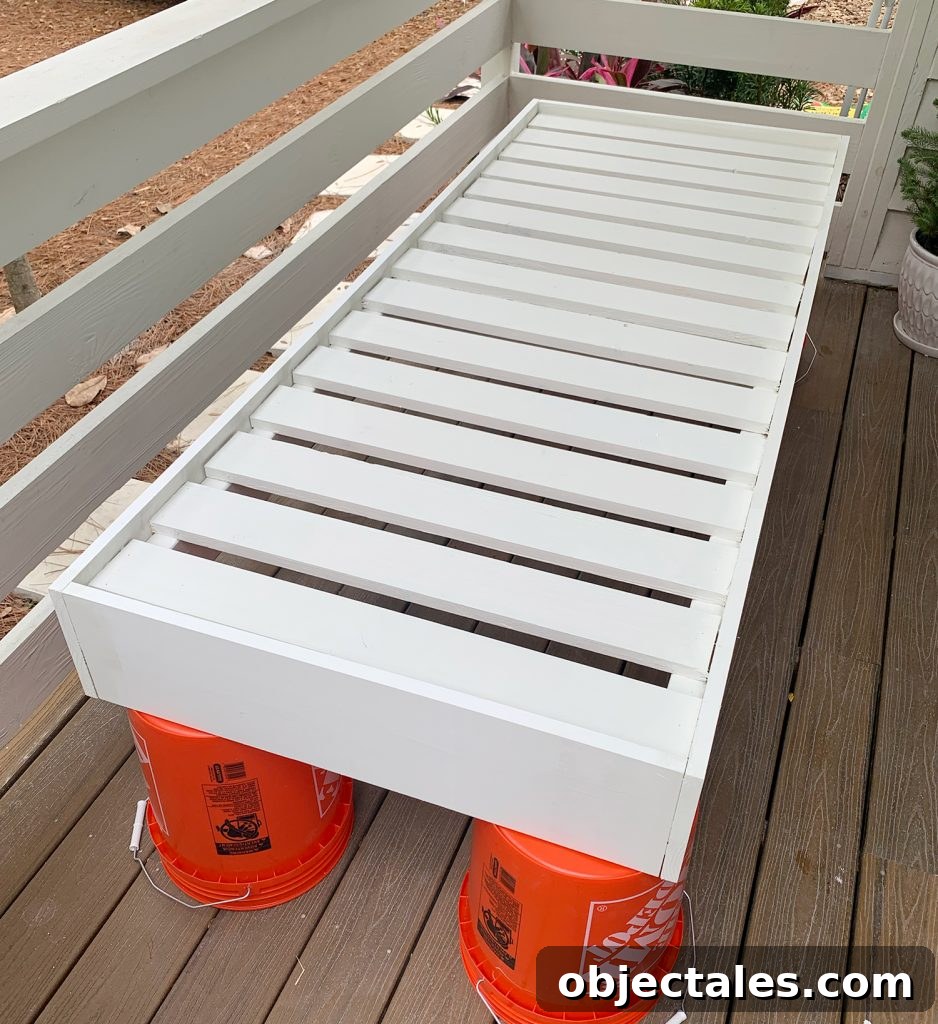 Build a Hanging Daybed: Step-by-Step DIY Tutorial 13 Daybed frame fully constructed and painted white