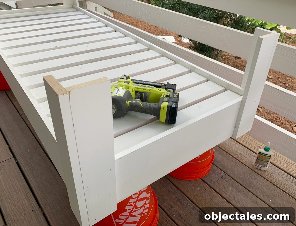 Build a Hanging Daybed: Step-by-Step DIY Tutorial 14 Daybed arm corners finished and in place