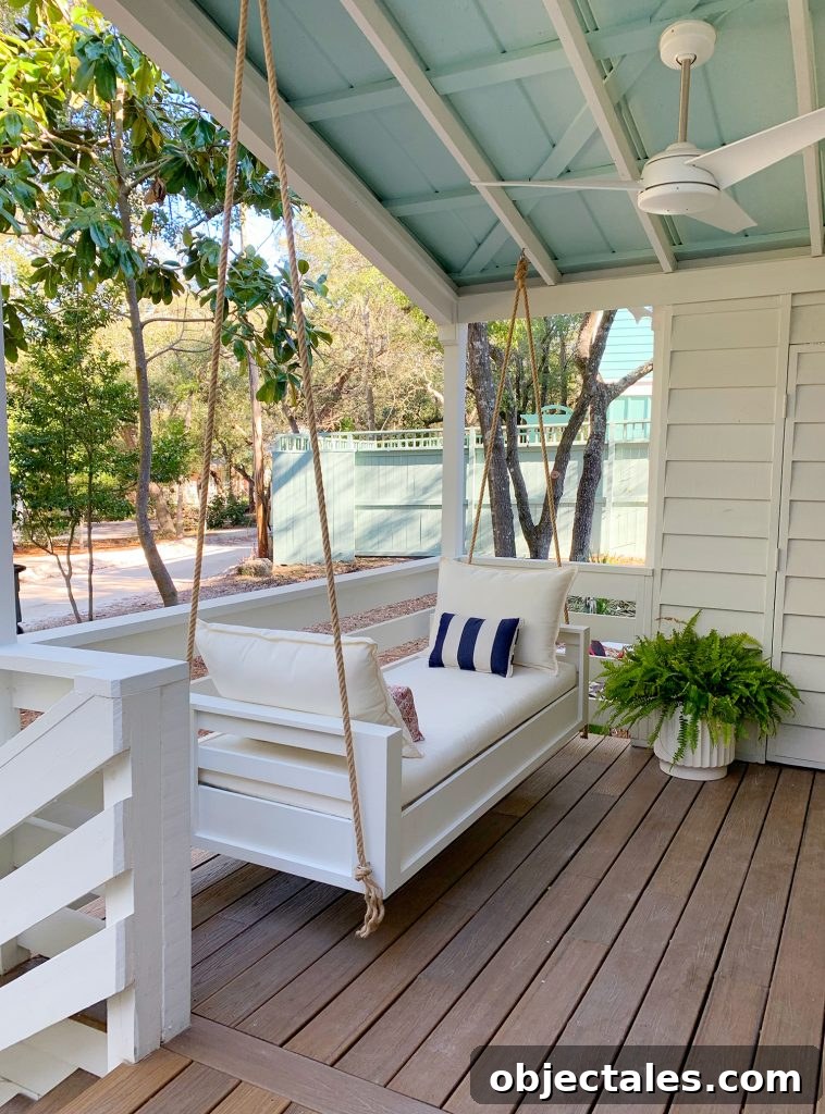 Build a Hanging Daybed: Step-by-Step DIY Tutorial 19 Angled View Of Finished Outdoor Hanging Daybed With White Cushions