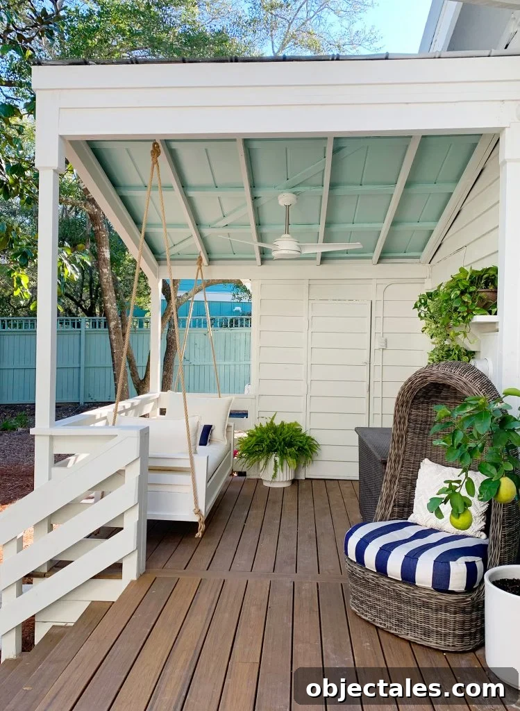 Build a Hanging Daybed: Step-by-Step DIY Tutorial 7 Finished White Hanging Daybed Under Covered Front Porch