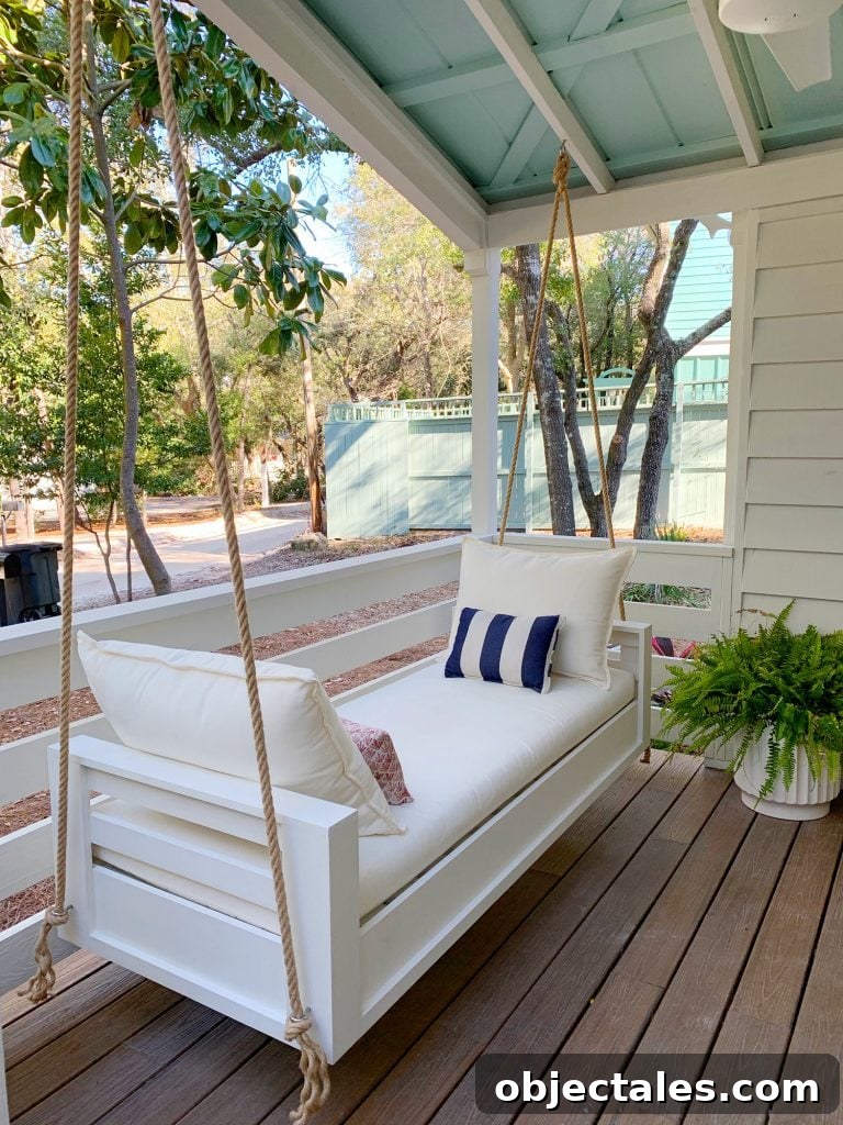 Build a Hanging Daybed: Step-by-Step DIY Tutorial 8 Angled View Of Finished Outdoor Hanging Daybed With White Cushions