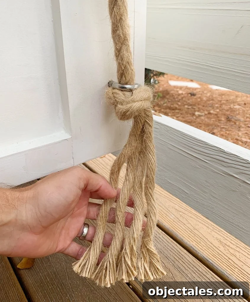 Frayed rope under the bottom of daybed eye hook