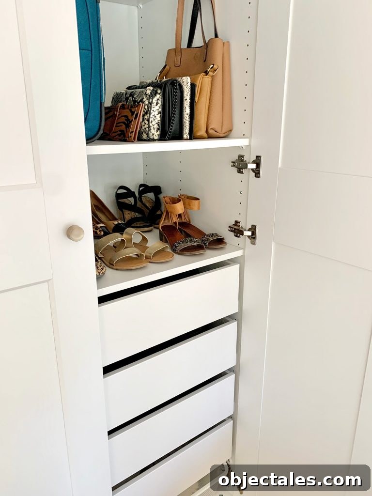View inside Ikea Pax wardrobe with shoes and purses
