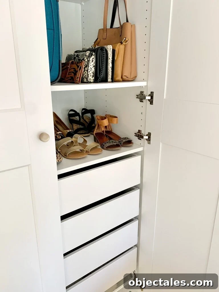 View inside Ikea Pax wardrobe with shoes and purses