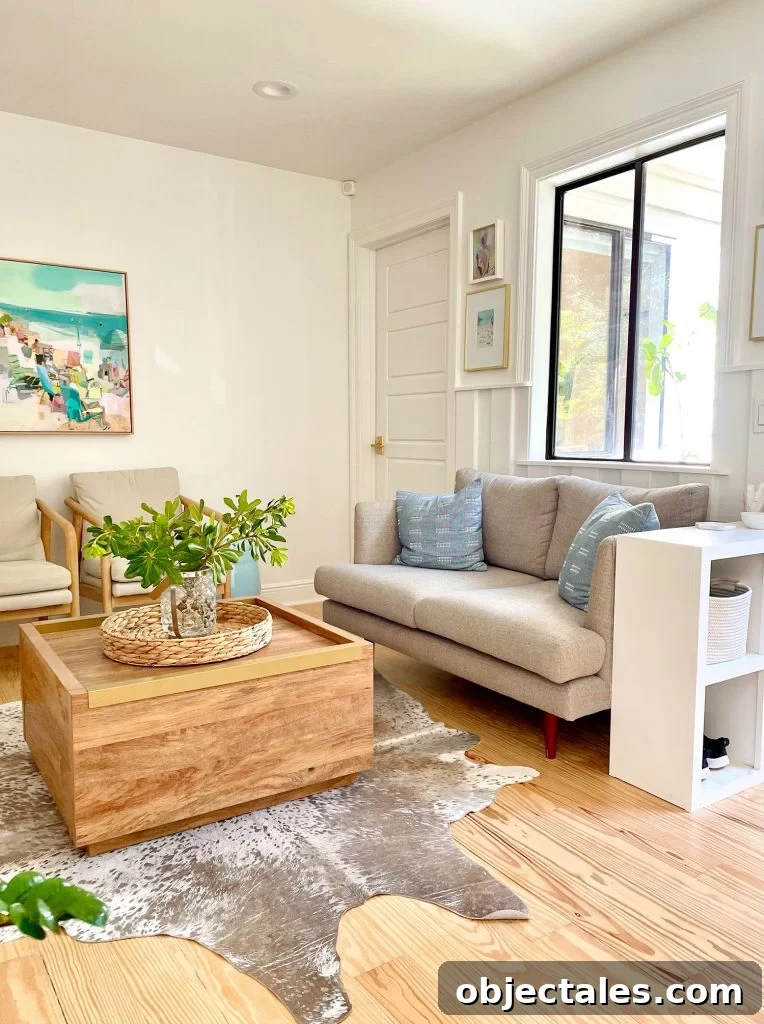 Kitchen Sitting Area With Gray Loveseat Wood Coffee Table Cowhide Rug And Storage Cubby