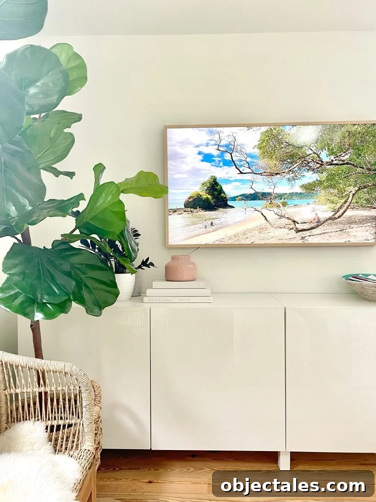 Family Room as Office, Art Studio, and Home Theater 2 Samsung Frame TV Over Ikea Besta Console In Modern Family Room With Faux Fig Tree