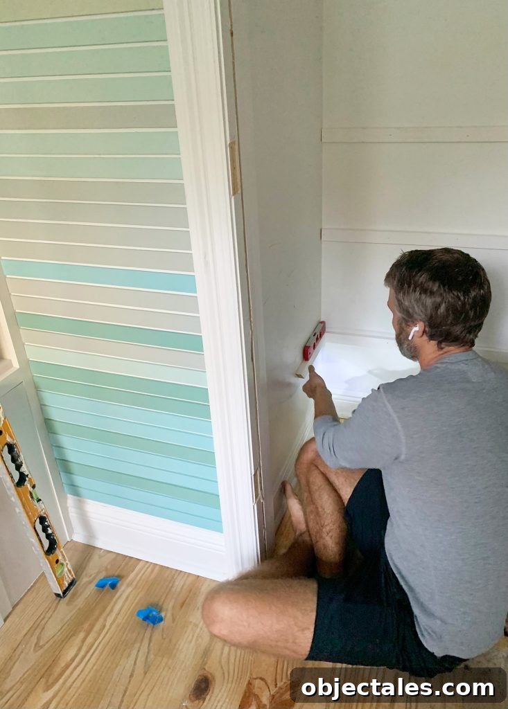 Adding Shelf Supports For DIY Closet Shelves With Level And Nail Gun