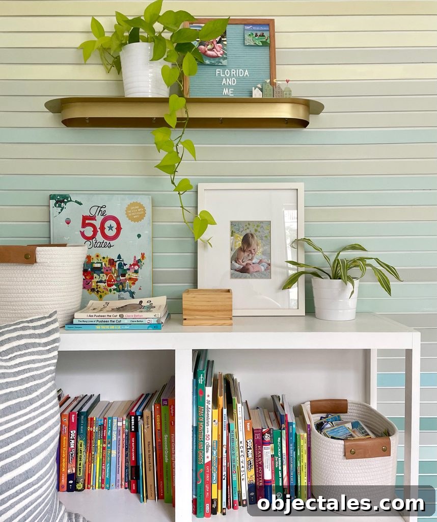 Shelf Detail Of Built In Bookcase Full Of Books And Toys