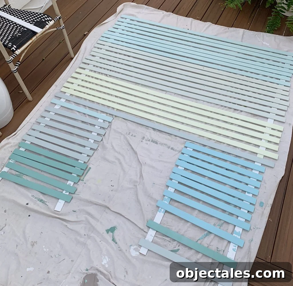 Painted Lattice Strips Laid Out On Deck In Various Blue Green And Gray Colors