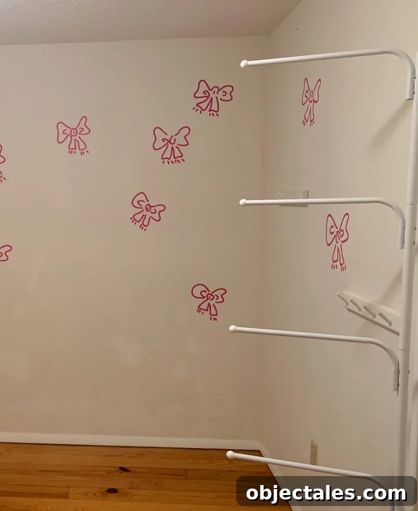 Before photo of Boys Bedroom With Painted Bow Mural On White Walls